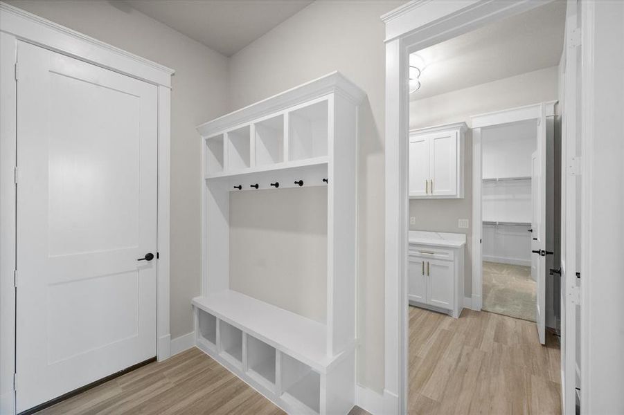 Mudroom featuring light hardwood / wood-style flooring