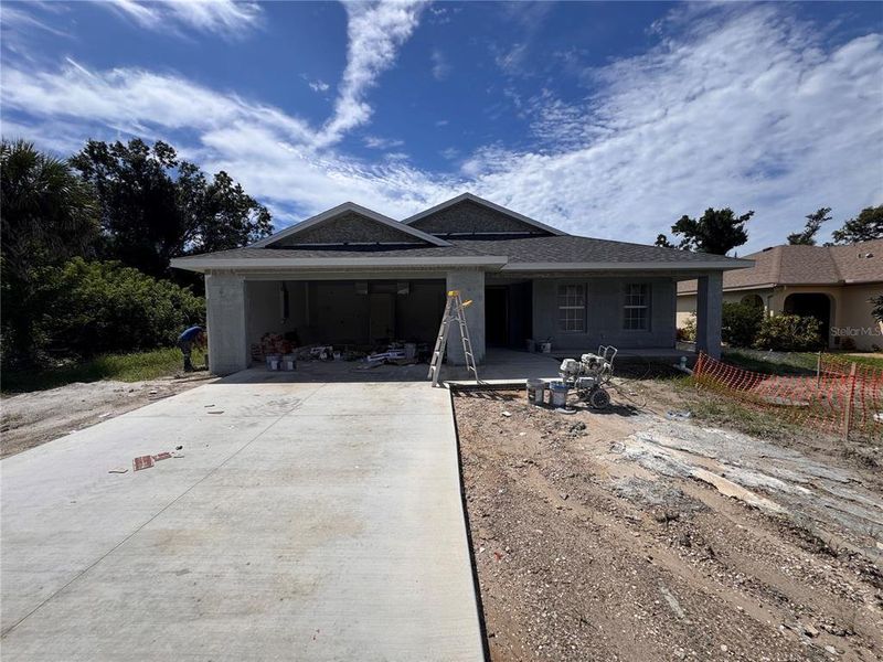 Front exterior of a new home in , Rotonda West, FL, highlighting curb appeal (Image 1). Front exterior of a new home in , Rotonda West, FL, highlighting curb appeal (Image 1).