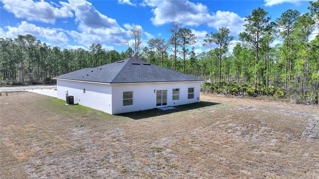Exterior details and patio area of a home in , Indian Lake Estates (Image 24).