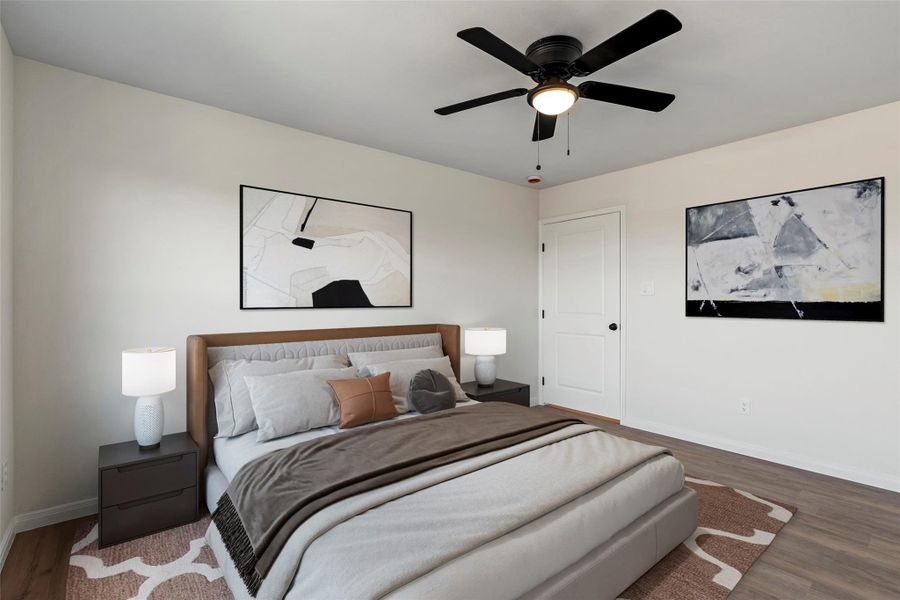 This virtually staged primary bedroom showcases a bright, airy design with ample space for a king-sized bed.