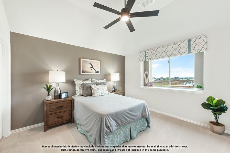 Bedroom with vaulted ceiling, ceiling fan, carpet flooring, and large window with neighborhood view Bedroom with vaulted ceiling, ceiling fan, carpet flooring, and large window with neighborhood view