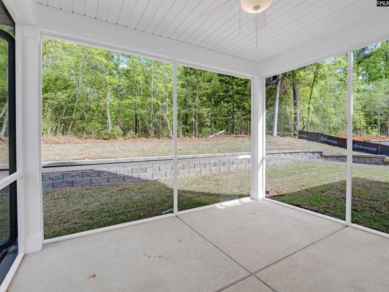 Exterior details and patio area of a home in Collins Cove, Chapin (Image 4). Exterior details and patio area of a home in Collins Cove, Chapin (Image 4).