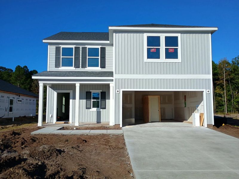 Exterior details and patio area of a home in Trieste at Bella Vita, Myrtle Beach (Image 3). Exterior details and patio area of a home in Trieste at Bella Vita, Myrtle Beach (Image 3).