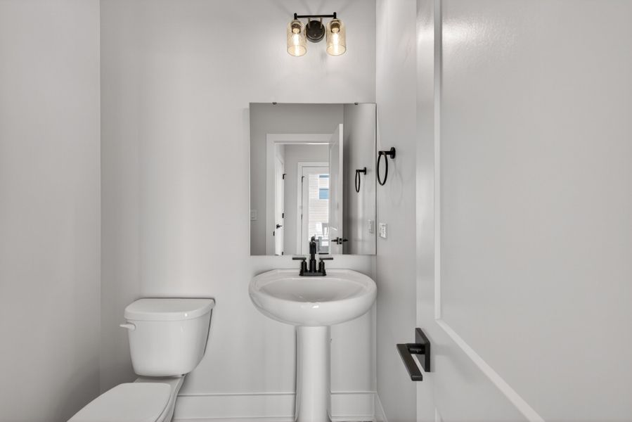 Representative furnished interior of a home built from the Atlas Interior Unit by Baker Residential in Atwater Station - Midtown Collection, Fuquay Varina (Image 19).