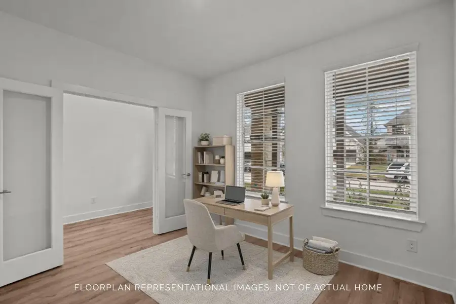 Furnished interior view inside a new home in The Oaks on 6th Street, Magnolia (Image 14).