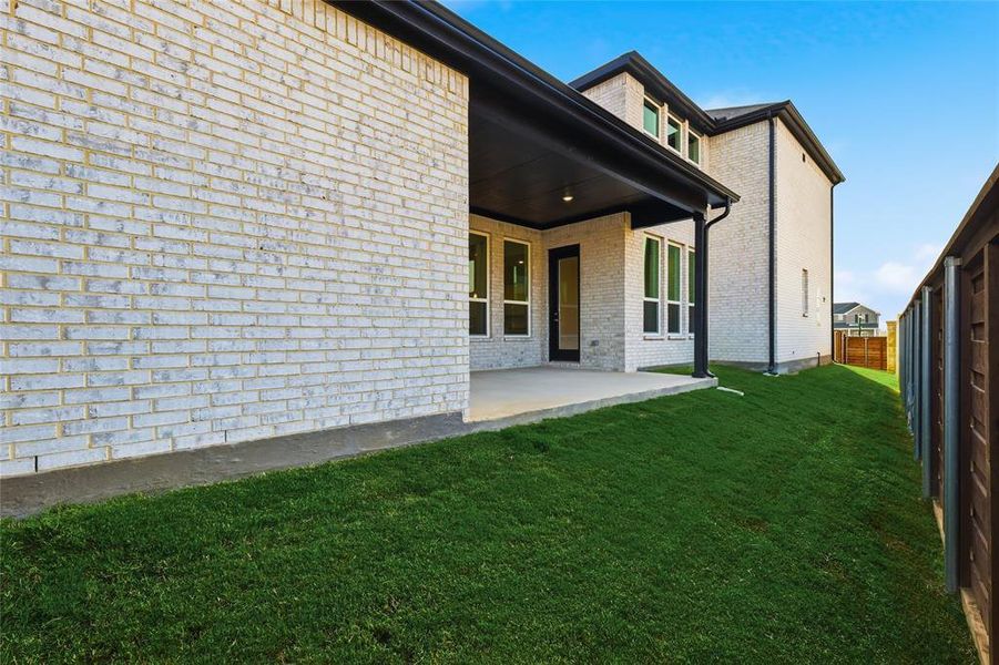 Exterior details and patio area of a home in Solterra Texas, Mesquite (Image 20).