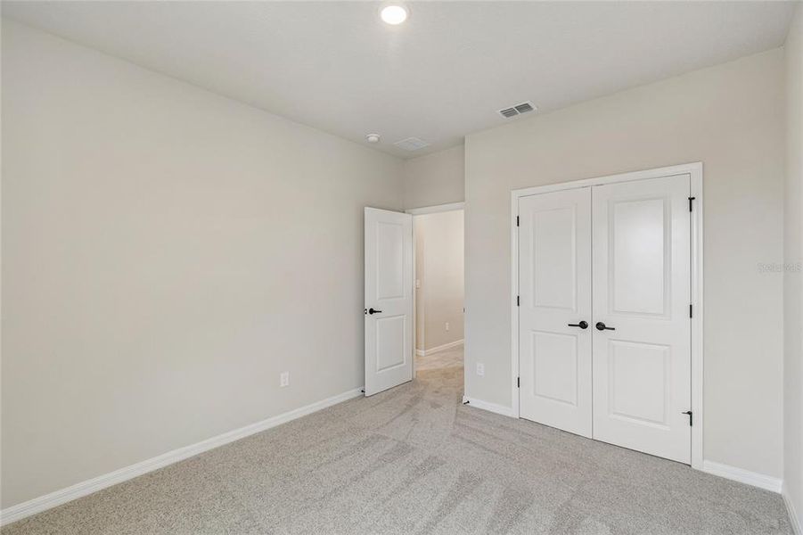Spacious, unfurnished interior of a new home in Weslyn Park in Sunbridge 34', St. Cloud (Image 27). Spacious, unfurnished interior of a new home in Weslyn Park in Sunbridge 34', St. Cloud (Image 27).