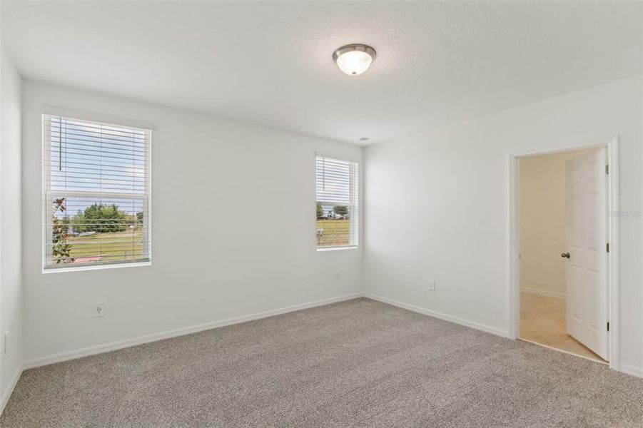 Spacious, unfurnished interior of a new home in Eden Hills, Lake Alfred (Image 22).