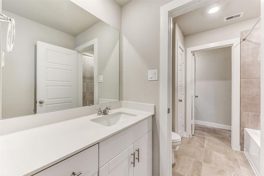 Furnished interior view inside a new home in Sundance Cove - Premier Series, Crosby (Image 17).