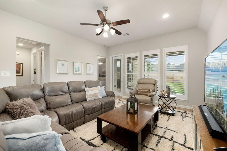 Bright open-concept living area with seamless flow into the dining space.