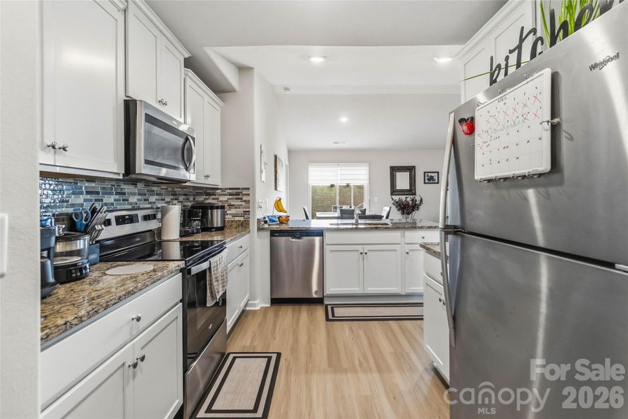Furnished interior view inside a new home in McKee Creek Village, Charlotte (Image 12).