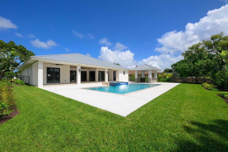 Exterior details and patio area of a home in , Stuart (Image 24).
