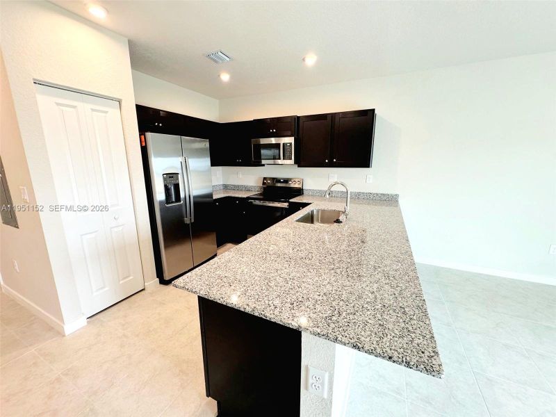 Furnished interior view inside a new home in , Florida City (Image 4). Furnished interior view inside a new home in , Florida City (Image 4).