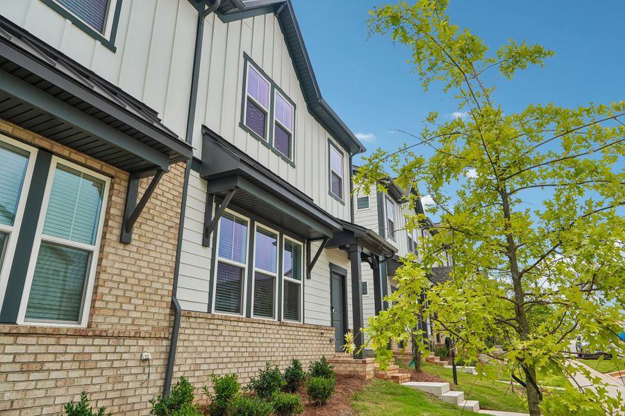Exterior details and patio area of a home in Terraces at the Exchange, Indian Land (Image 24).