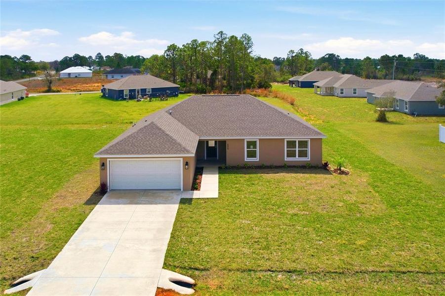 Front exterior of a new home in , Sebring, FL, highlighting curb appeal (Image 20).