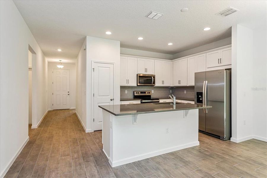 Furnished interior view inside a new home in Willowbrook North, Winter Haven (Image 11). Furnished interior view inside a new home in Willowbrook North, Winter Haven (Image 11).