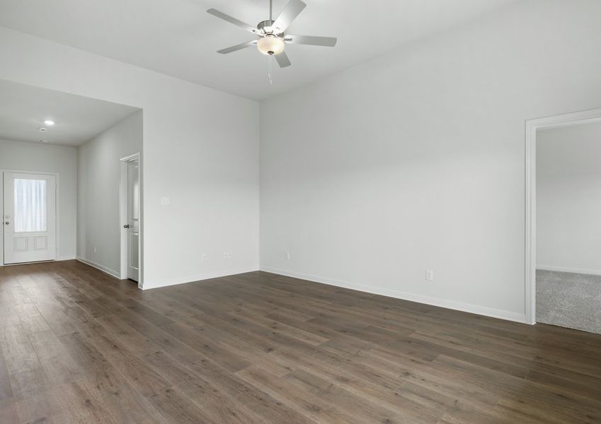 The family room is large and has plenty of space for furniture.