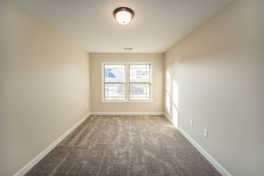Representative unfurnished interior of a home built from the Inman by Enchanted Homes in Hampshire Heights, Moore (Image 21).