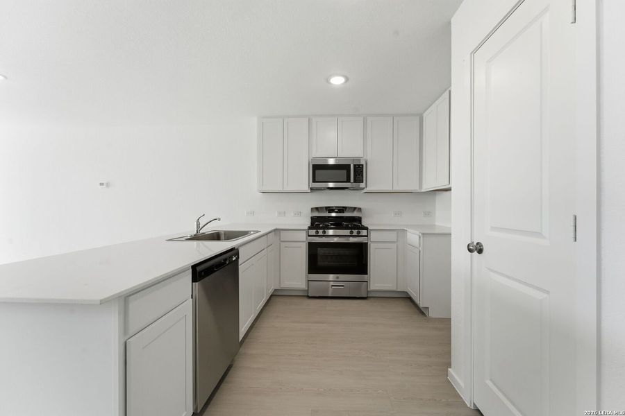 Furnished interior view inside a new home in , New Braunfels (Image 6).