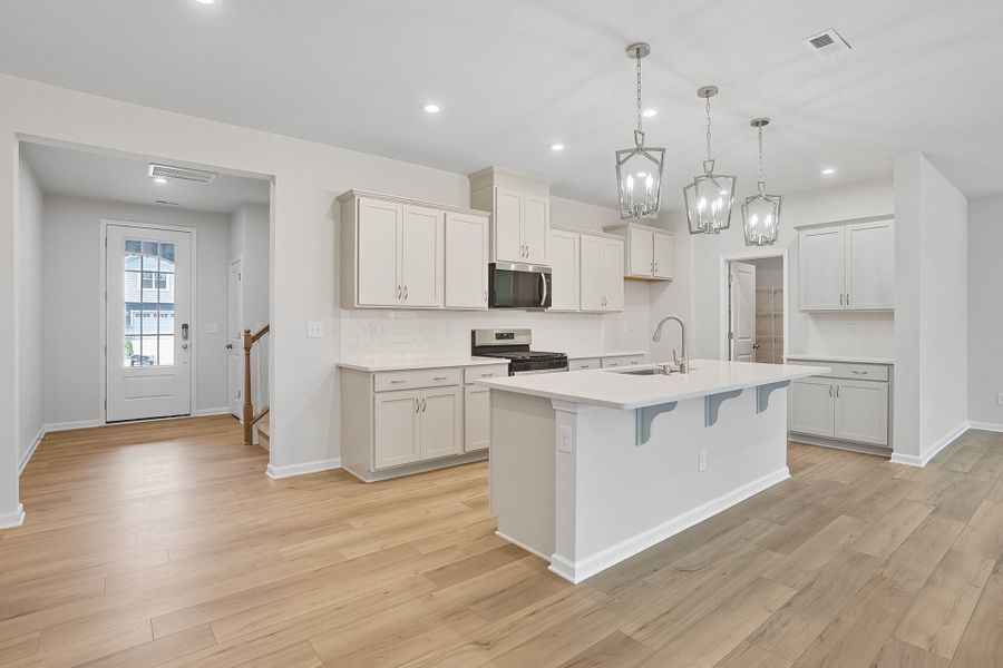 Furnished interior view inside a new home in Waxhaw Landing, Monroe (Image 3).
