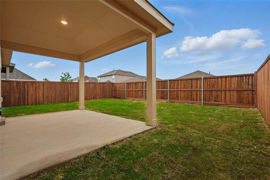 View of yard with a patio and a fenced backyard View of yard with a patio and a fenced backyard