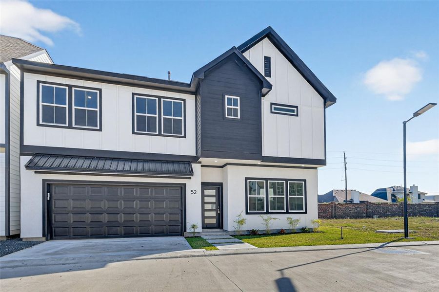 Front exterior of a new home in Metro Village, Houston, TX, highlighting curb appeal (Image 24).