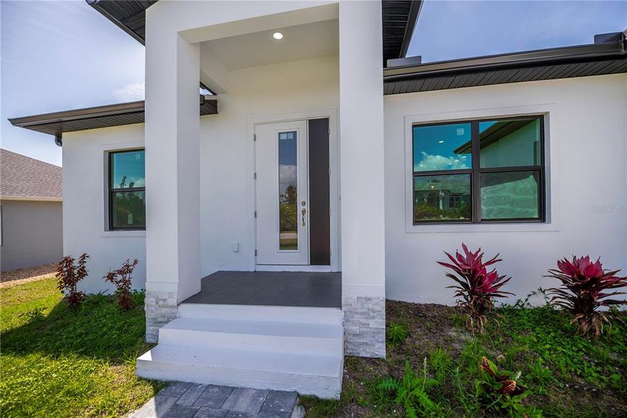 Exterior details and patio area of a home in , Port Charlotte (Image 32).