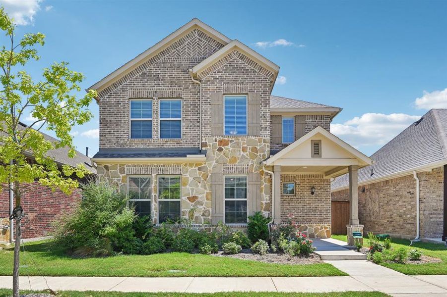 Front exterior of a new home in , Garland, TX, highlighting curb appeal (Image 19). Front exterior of a new home in , Garland, TX, highlighting curb appeal (Image 19).