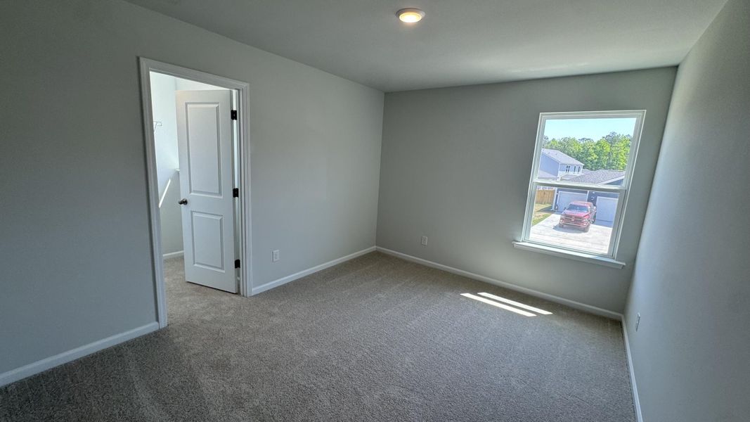 Spacious, unfurnished interior of a new home in Watson Hill, Summerville (Image 38).