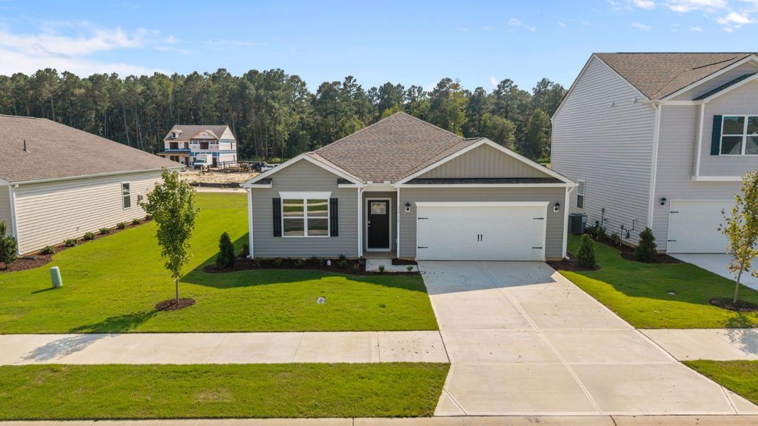 Front exterior of a new home in West New Bern, New Bern, NC, highlighting curb appeal (Image 2).