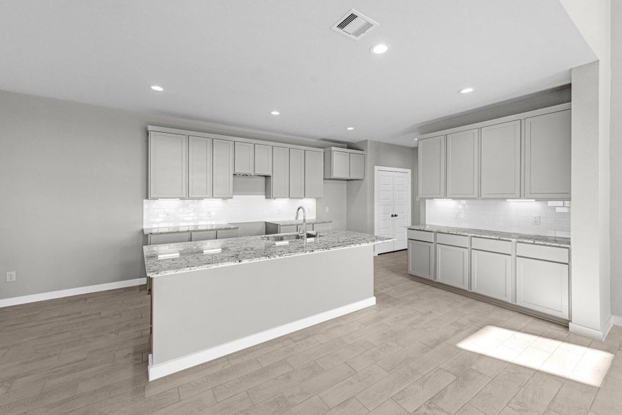 Furnished interior view inside a new home in Sunterra Lakes, Fulshear (Image 11).