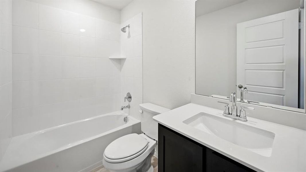 Full bathroom with vanity and  shower combination