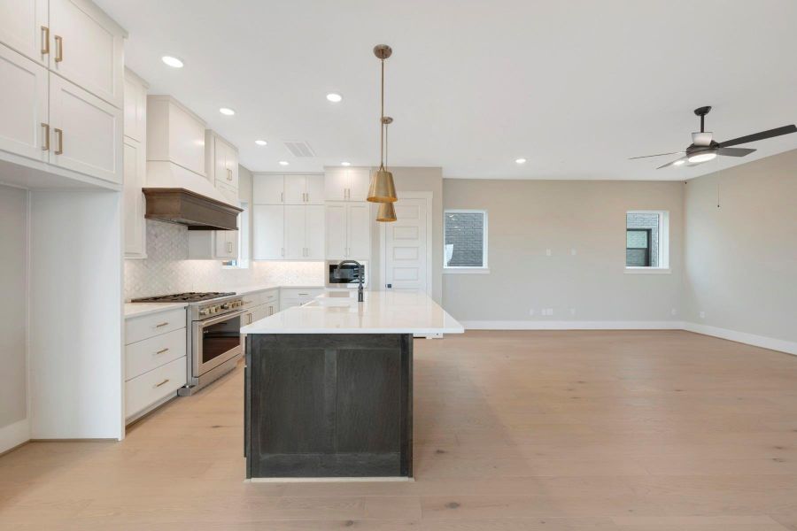 Furnished interior view inside a new home in Easthaven at Bridgeland Central - Vision Collection, Cypress (Image 4).