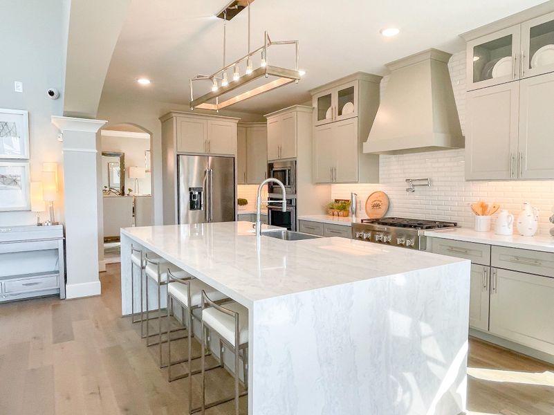 Furnished interior view inside a new home in Bridgeland, Cypress (Image 13).