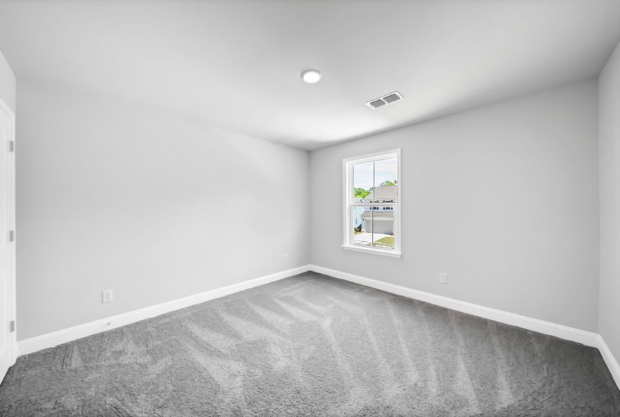 Spacious, unfurnished interior of a new home in Monroe Preserve, Chapin (Image 42).