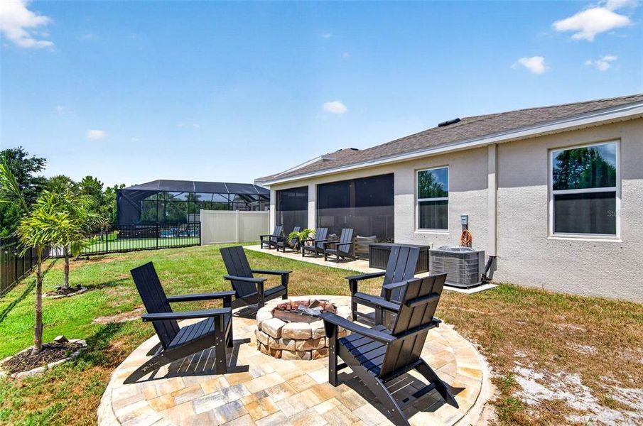 Exterior details and patio area of a home in Bella Lago, Parrish (Image 25).