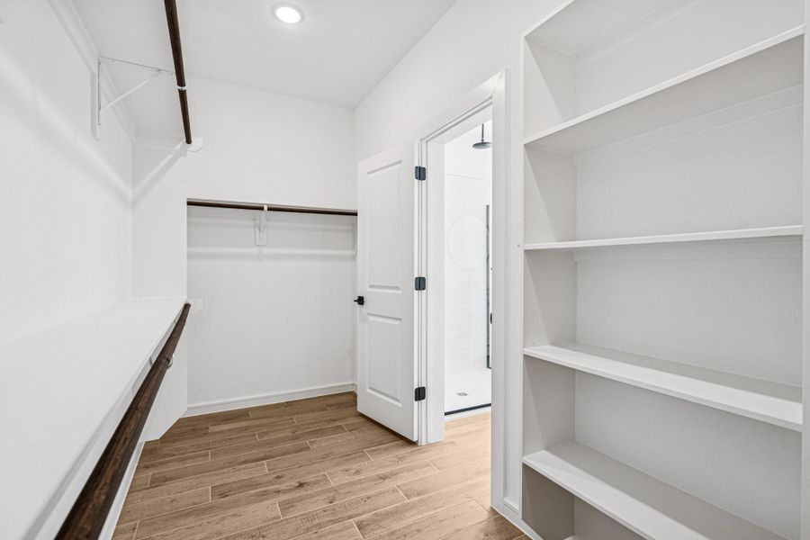 Primary walk-in closet (*Photo not of actual home and used for illustration purposes only.)