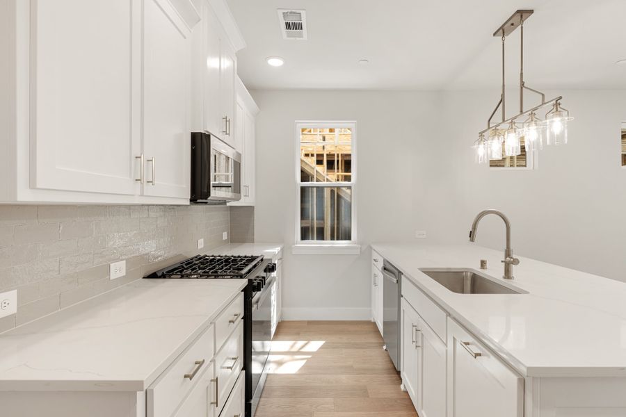 Furnished interior view inside a new home in Willow Grove Townhomes, Melissa (Image 12).