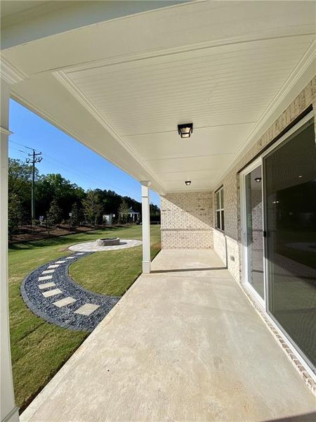 Exterior details and patio area of a home in Overland, Locust Grove (Image 3).