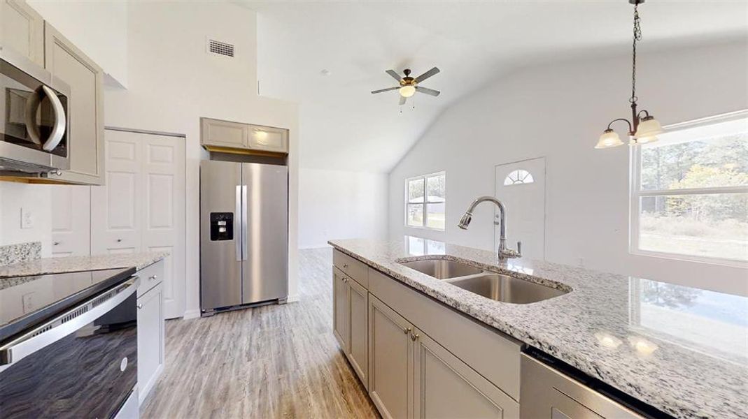 Furnished interior view inside a new home in , Dunnellon (Image 3).