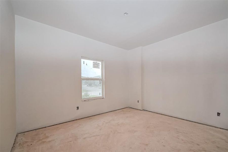 Bright and airy, this spacious bedroom features a window that lets in natural light and a full entry closet offering functional storage.