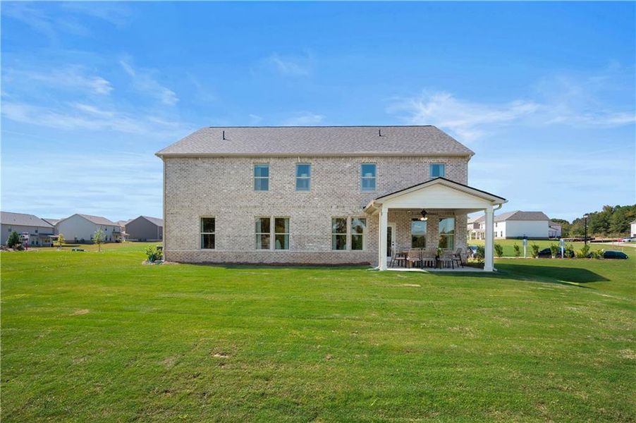 Exterior details and patio area of a home in Adagio, Dacula (Image 4).