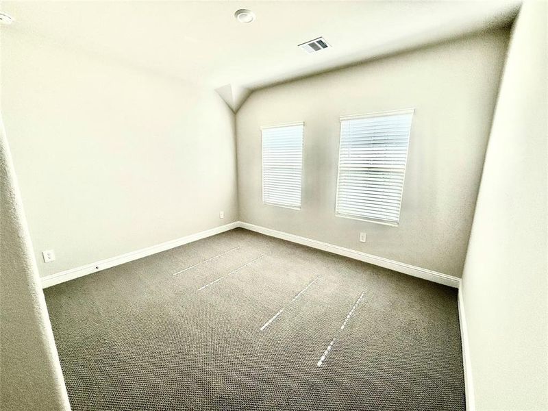 Neutral-toned wall paint and textured carpeting Neutral-toned wall paint and textured carpeting