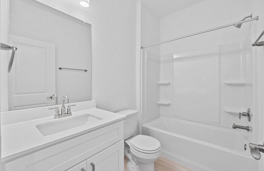 Furnished interior view inside a new home in Crosswinds, Kyle (Image 10).