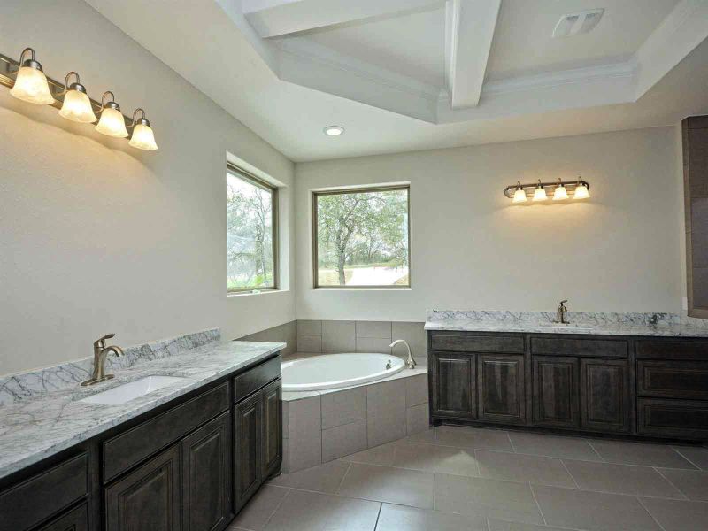 Representative furnished interior of a home built from the Madera II by Giddens Homes in Scofield Farms Estates, Georgetown (Image 270).