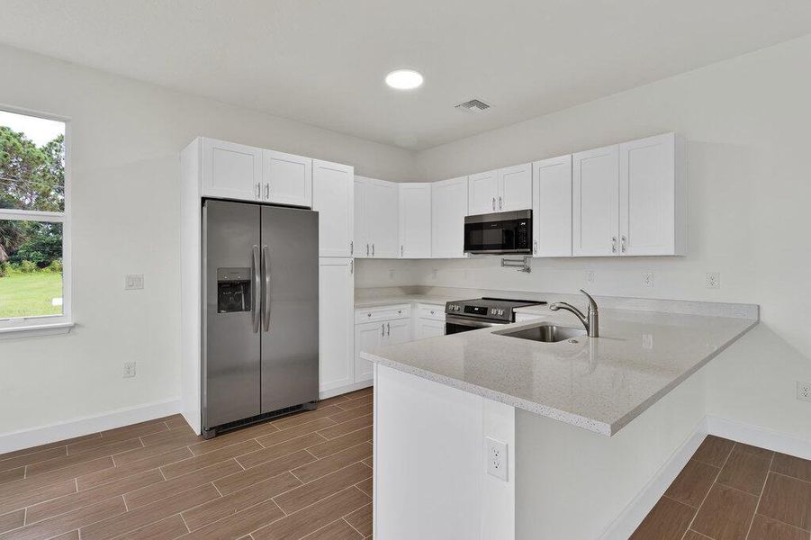 Furnished interior view inside a new home in , Vero Beach (Image 9). Furnished interior view inside a new home in , Vero Beach (Image 9).