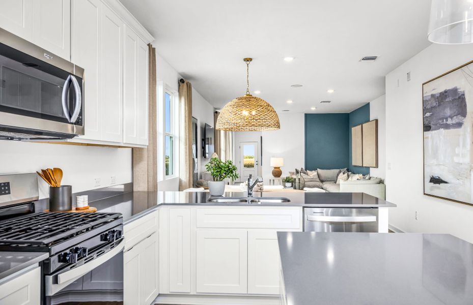 Representative furnished interior of a home built from the Afton by Pulte Homes in Crosswinds, Kyle (Image 3).