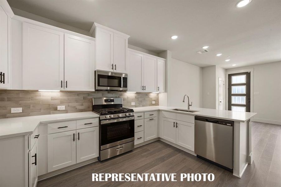 With the kitchen open to the dining and family rooms, the chef in the family will never be left out of the party!