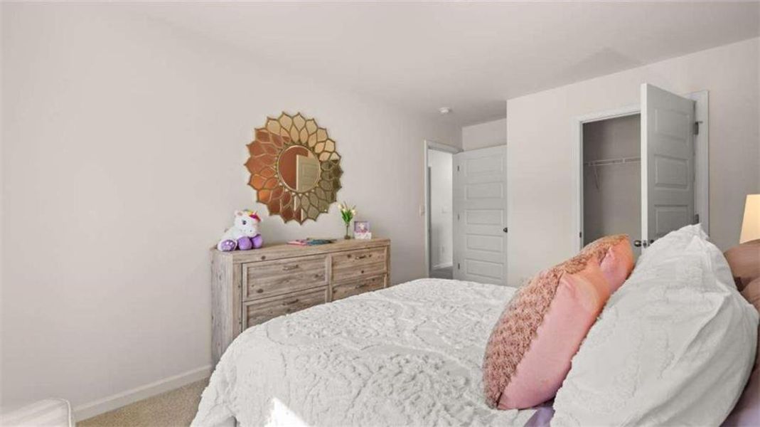 Furnished interior view inside a new home in Oakchase at Hampton, Hampton (Image 34).