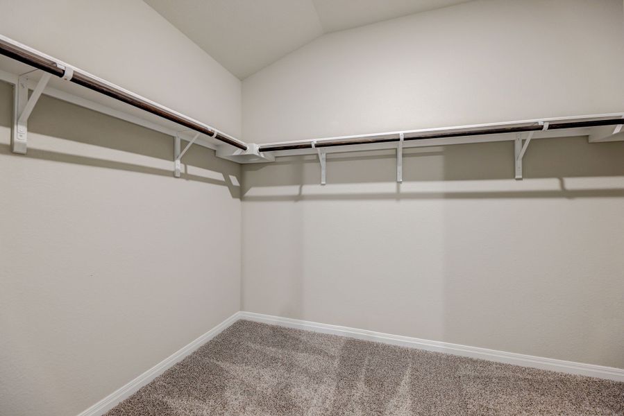 Have plenty of room for storage in the primary bedroom's closet.